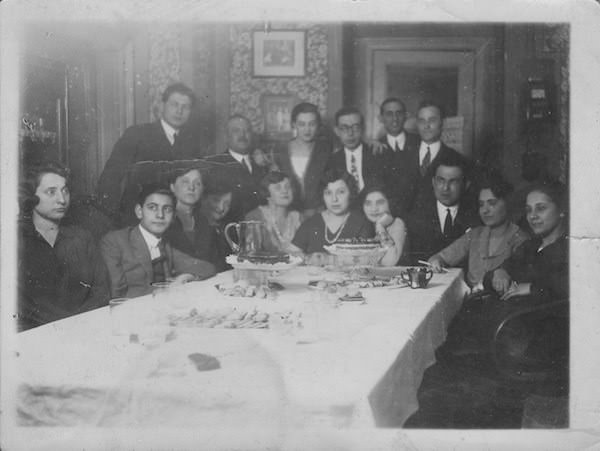 An extended family gathering at a big dining table